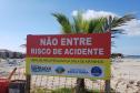 Foto de placa advertindo a entrada em obra de microdrenagem