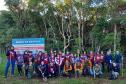 Foto de voluntários participando da ação de conservação