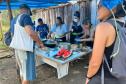 Foto de visitantes durante almoço no evento