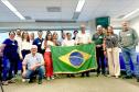 FOTO OFICIAL COM A BANDEIRA DO BRASIL