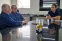Secretário e presidente durante reunião