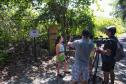 Foto de servidora do IAT dando entrevista em evento
