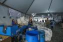 Foto de visita do secretário a feira em Curitiba