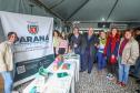 Foto de visita do secretário a feira em Curitiba