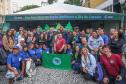 Foto de visita do secretário a feira em Curitiba