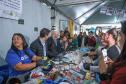 Foto de visita do secretário a feira em Curitiba