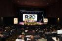 Foto de autoridades em apresentação