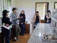 Foto de estudantes conhecendo viveiro do IAT