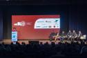 Foto de diretor do IAT apresentando em evento