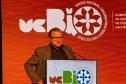 Foto de diretor do IAT apresentando em evento