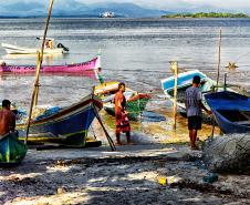 Pescadores a beira da praia